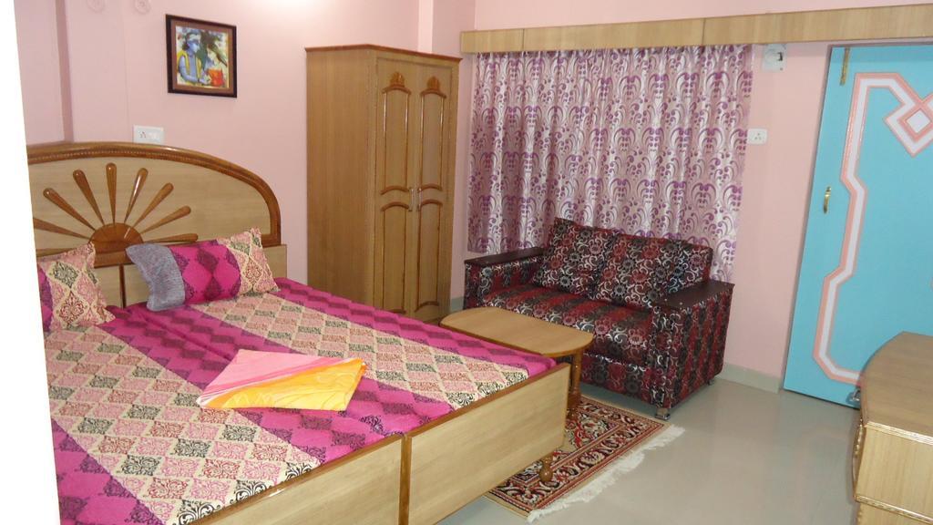 Krishna Paying Guest House Váránaszi Szoba fotó